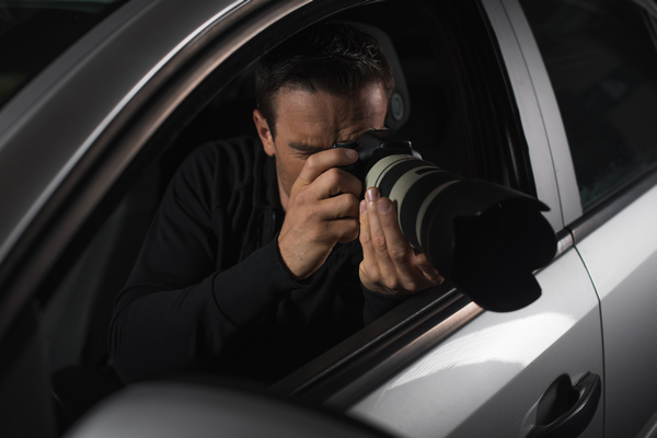 Private Investigator Conducting Investigation Cincinnati Private Investigator Conducting Surveillance Investigation