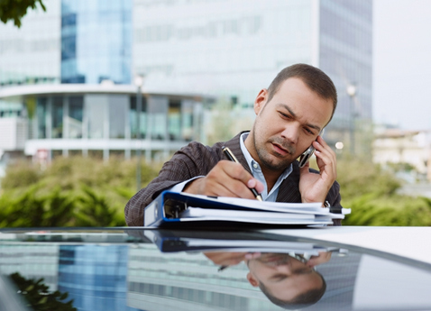 Private Investigator Taking Case Notes Cincinnati Private Investigator Services